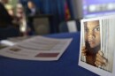 A placard of a child sits on a table during a conference Oct. 31 on human sex trafficking in Atlanta. The Georgia Department of Education estimates that about 5,000 girls in the state are at risk for trafficking each year.