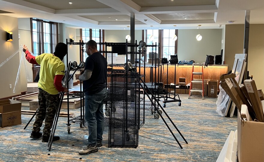 A work crew assembles shelving in the members' lounge on the second floor of the Zeiterion. The historic Zeiterion theater in New Bedford is reopening after a two-year, $37 million renovation. Images from Jan. 6, 2026 — 11 days before the opening show.