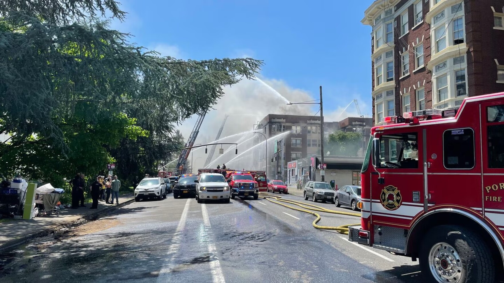 Crews battle large fire in downtown Portland apartment building