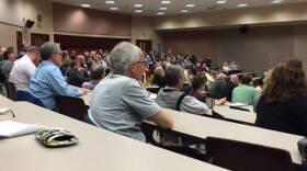 Most of the Saint Joseph's College faculty met with the chairman of the school's board of trustees Monday.