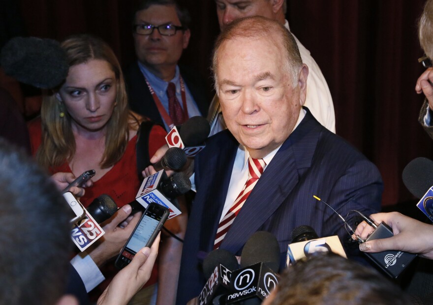 University of Oklahoma President David Boren talks with the media following his announcement that he will resign as head of the state's flagship university at the end of the current school year.