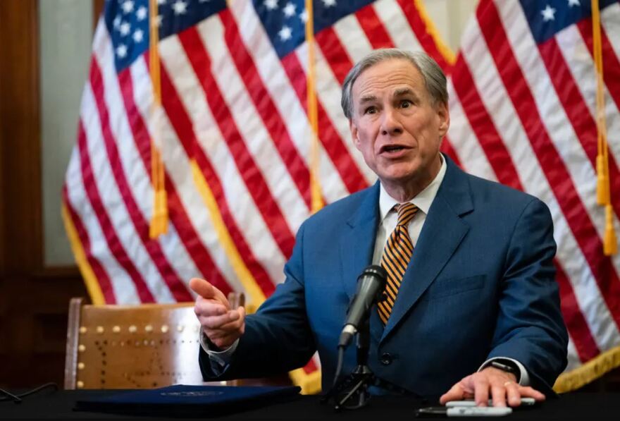 Gov. Greg Abbott signs Senate Bill 2 and Senate Bill 3 at the Texas Capitol. The omnibus bills will change the state’s power grid and the people who oversee it.