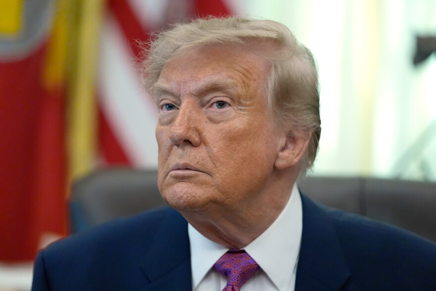 President Donald Trump listens to a question from a reporter in the Oval Office of the White House, Thursday, Aug. 27, 2026, in Washington.