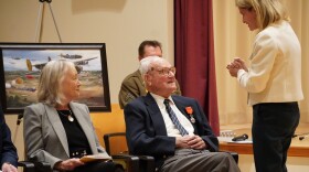 John Homan (center) received the French Legion of Honor medal at a ceremony Wednesday. To the left is his daughter Kimberly Homan, and to the right is Caroline Monvoisin, the French Consul General who presented the honor. 