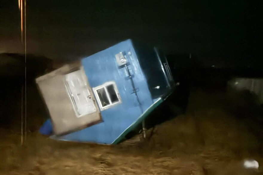 An overturned home in Kotlik. The National Weather Service reported a maximum wind gust of 78 mph in Kotlik Sunday morning.