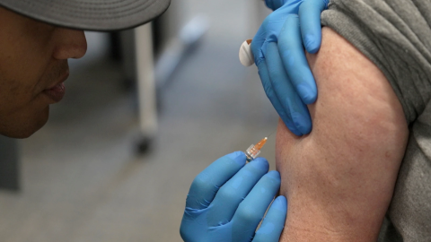 An individual administers a measles, mumps and rubella vaccine on, Feb. 26, 2025, in Lubbock, Texas.
