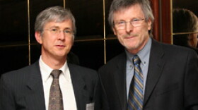 Michael Free, at right, has been made an Officer of the Order of the British Empire.