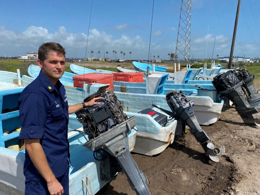 Lt. Commander Dan Ippolito shows Mexican lanchas caught and confiscated while fishing illegally in the Gulf. They are stored at the US. Coast Guard South Padre Station and then destroyed.