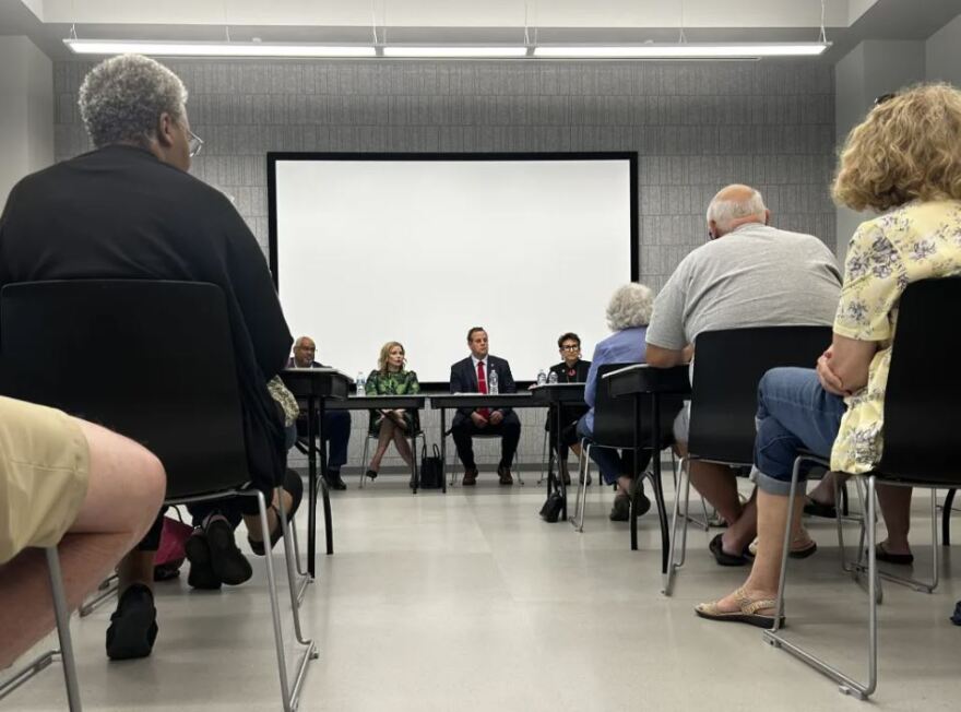 From left, Fairo Mitchell, director of the public utilities for the Oklahoma Corporation Commission, Joy McGill, state director of advocacy for AARP, State Rep. Brad Boles, R-Marlow, and Rep. Meloyde Blancett, D-Tulsa, at a town hall about electricity rates held Thursday, Aug. 13, 2026, at the Bronson Brookside Library in Tulsa.