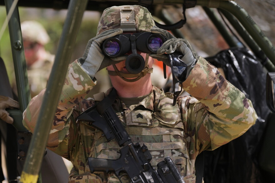 U.S. Army personnel keep watch over the U.S.-Mexico border in Roma, Texas, Thursday, Oct. 8, 2026.