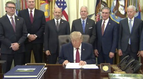From left, Rep. Nick Begich III, Gov. Mike Dunleavy, Howard Lutnick, President Donald Trump, U.S. Sen. Dan Sullivan, Doug Burgam and Chris Wright stand in the Oval Office on Wednesday, Sept. 30, 2026 in Washington, D.C.