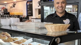 Eber Gomes, one of the owners of Bread Brazil bakery in Fall River, says he is looking forward to the business that the commuter rail may bring.