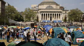 Student protesters gather in protest inside their encampment on the Columbia University campus. (Stefan Jeremiah/AP)