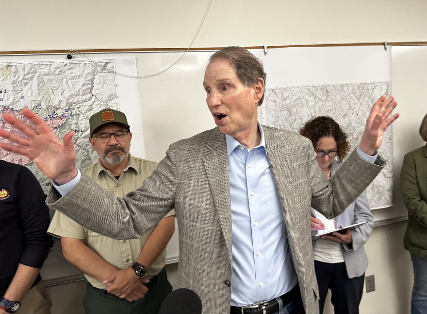 U.S. Senator Ron Wyden talks to reporters after a briefing with forest officials.