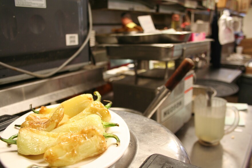 Fried yellow chilis in the Fortune Garden kitchen. This dish showed up on almost every table at the Chinese restaurants we visited on both sides of the U.S. border with Mexico. Their sauce has kind of a margarita flavor: lemon with lots of salt.