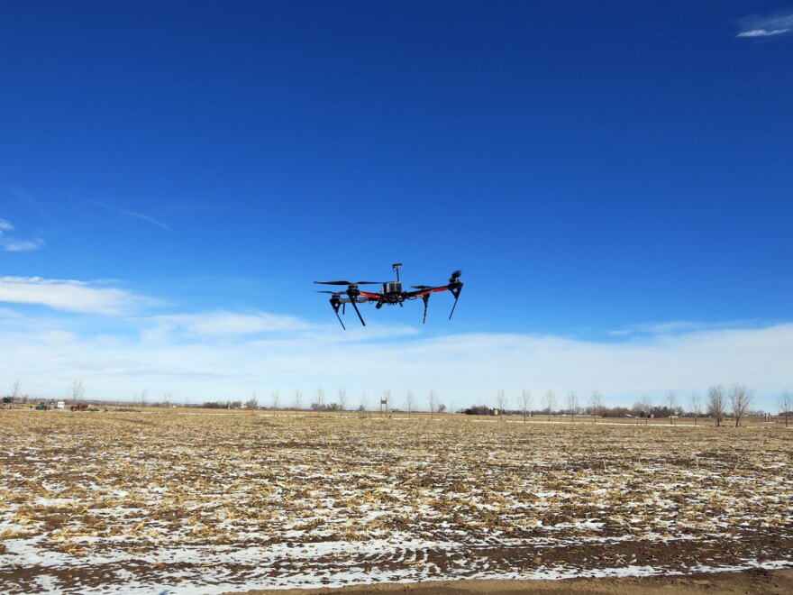 Many farmers hope to use flying drones to scout their fields and identify problem areas, but commercial drone use is currently banned. (Luke Runyon/Harvest Public Media)