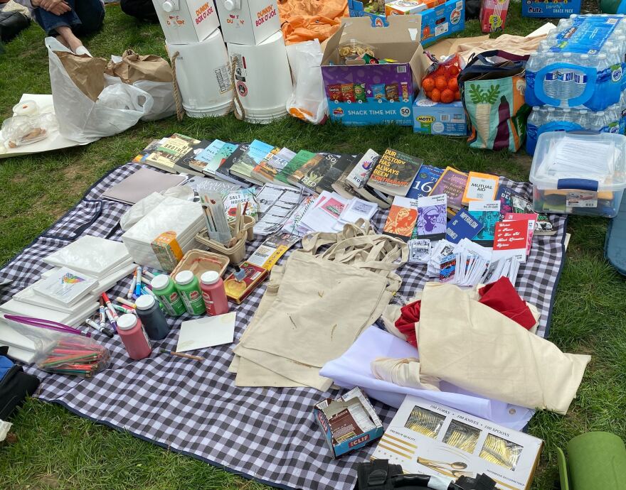  University of Pittsburgh students set out materials and snacks during pro-Palestinian sit-in protest.