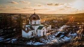 TOPSHOT - This aerial photograph shows a damaged church, which was used by Russian troops as a makeshift hospital, in the village of Mala Komyshuvakha, Kharkiv region, on Febr. 22, 2023, amid Russia's military invasion on Ukraine. (Ihor Tkachov/AFP via Getty Images)