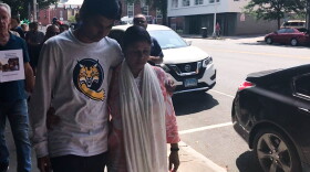 Samir Mahmud supports his mother Salma Sikander as she leaves her final immigration check-in before a deportation scheduled for Thursday, August 23.