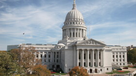 Shot of the Wisconsin Capitol building from the top of a firefighter ladder truck.