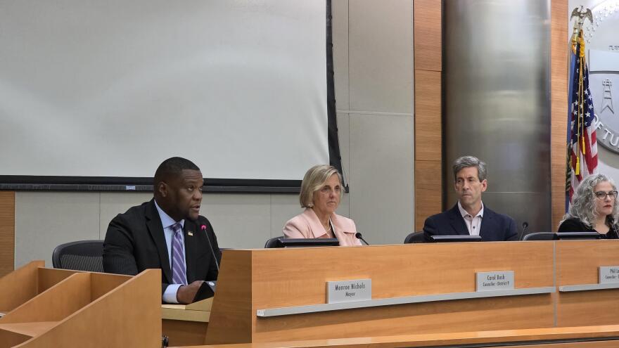 Tulsa Mayor Monroe Nichols (left) presents the fiscal year 2027 budget proposal to Tulsa City Council on Wednesday, April 22, 2026. Councilors (from left to right) Carol Bush, Phil Lakin and Lori Decter Wright look on.