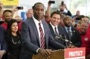 Florida Surgeon Gen. Dr. Joseph A. Ladapo stands behind a podium and speaks before a bill signing by Gov. Ron DeSantis on Nov. 18, 2021, in Brandon, Fla.