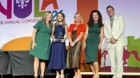 Members of the Eugene Chamber of Commerce accepting the award for Chamber of the Year in New Orleans, Louisiana.