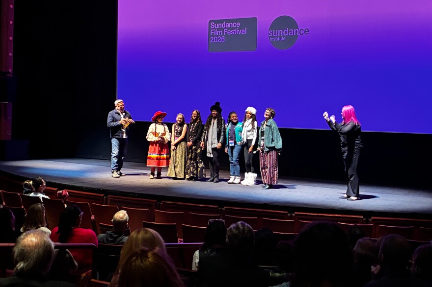 Girls featured in the "Cookie Queens" documentary answer questions alongside director Alysa Nahmias after the first audience screening of the film on Saturday, Jan. 24, 2026.