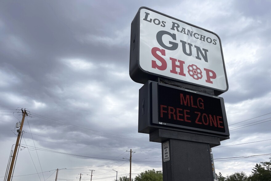 The marquee at a gun shop in Los Ranchos, N.M, on Sept. 11, 2023. 