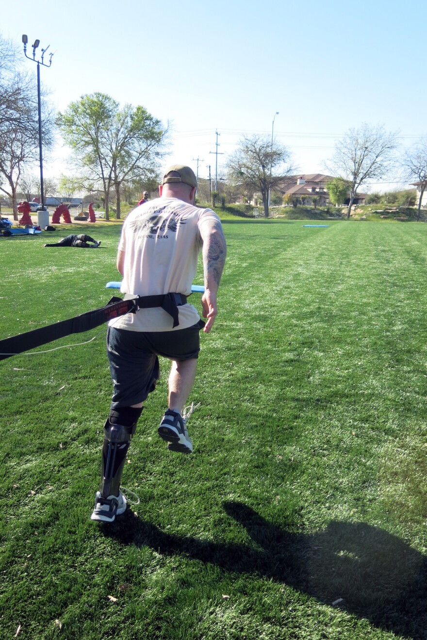 Army Spc. Joey McElroy practices resistance running with the IDEO. Soldiers who are fitted with the brace spend four weeks learning how to use it in a "Return to Run" program.