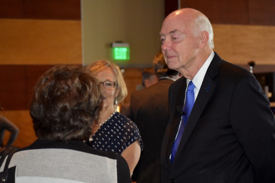 Marc Johnson mingling at the reception following his annual university speech.