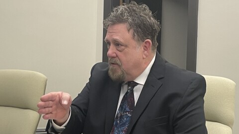 Whitehall City Councilmember Gerald Dixon speaks to reporters before he is sworn into a new term on city council on December 9, 2025. Dixon was released from jail earlier in the day after being charged with sexually abusing a minor.