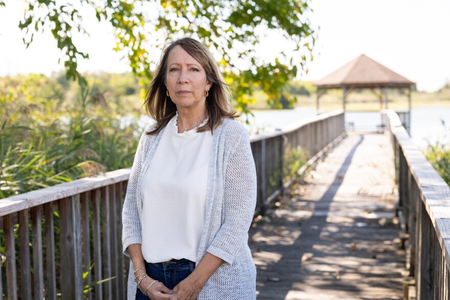 Deborah Buttgereit poses near her daughter’s home in Hampton, Virginia. Buttgereit struggled to afford health coverage after her husband’s death and was uninsured when she slipped on some ice in Montana and broke her arm. The surgery bill was nearly $98,000, well above the initial estimate the hospital provided.