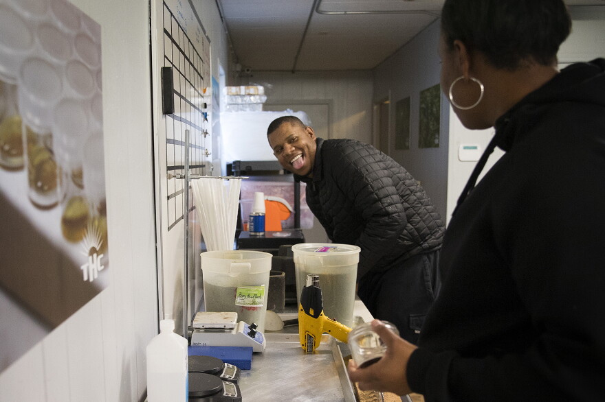 Raft Hollingsworth III laughs with his sister Joy Hollingsworth on Thursday, January 18, 2018, at The Hollingsworth Cannabis Company in Mason County. 