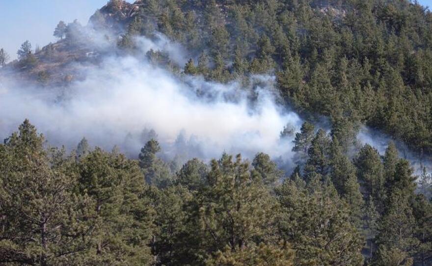 The Indian Gulch Fire fire burns in Golden Gate Canyon Tuesday.