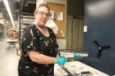 History Colorado head curator Rachael Storm holds up spooky and strange artifacts in the museum archives on Friday, Sept. 12th, 2025, in Denver, Colo. More than 500 objects will be on display at the Creeporado event.