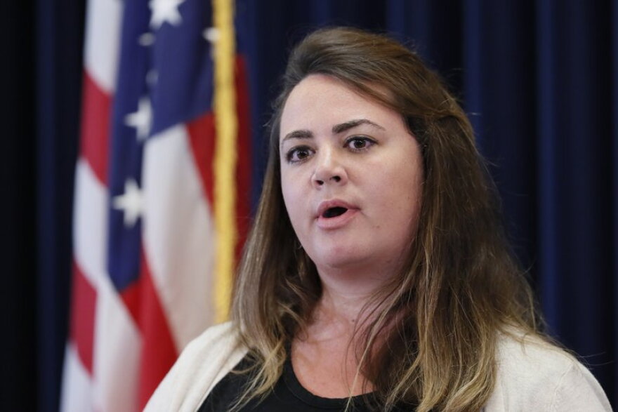 In this June 18, 2020, file photo, Iowa state epidemiologist Dr. Caitlin Pedati updates the state's response to the coronavirus outbreak during a news conference at the Statehouse in Des Moines, Iowa.