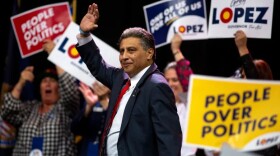 Republican candidate for governor Greg Lopez waves during the GOP assembly at the Broadmoor World Arena on Saturday, April 9, 2022, in Colorado Springs.