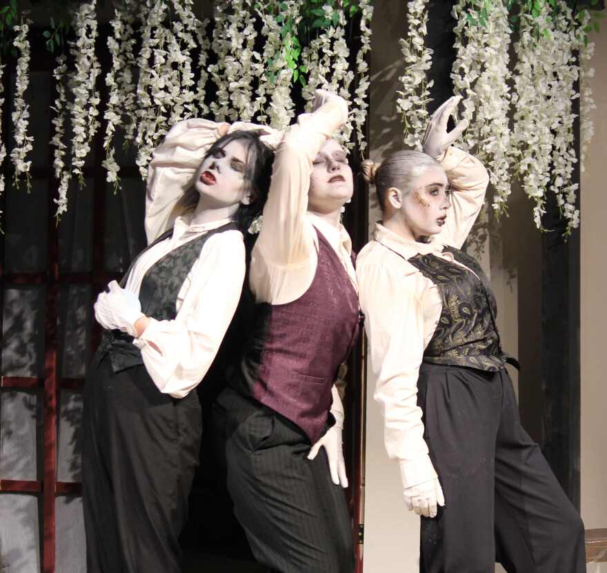 The 'three stones' function as a Greek chorus in Sarah Ruhl's retelling of the myth of Eurydice.