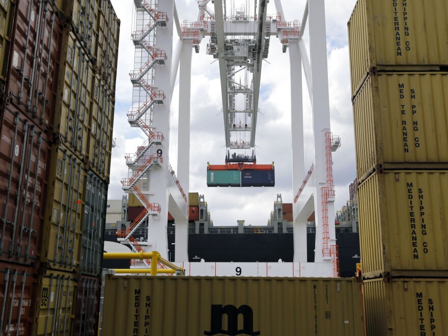 A crane removes a container from a ship at the Port of Baltimore's Seagirt Marine Terminal on March 1.