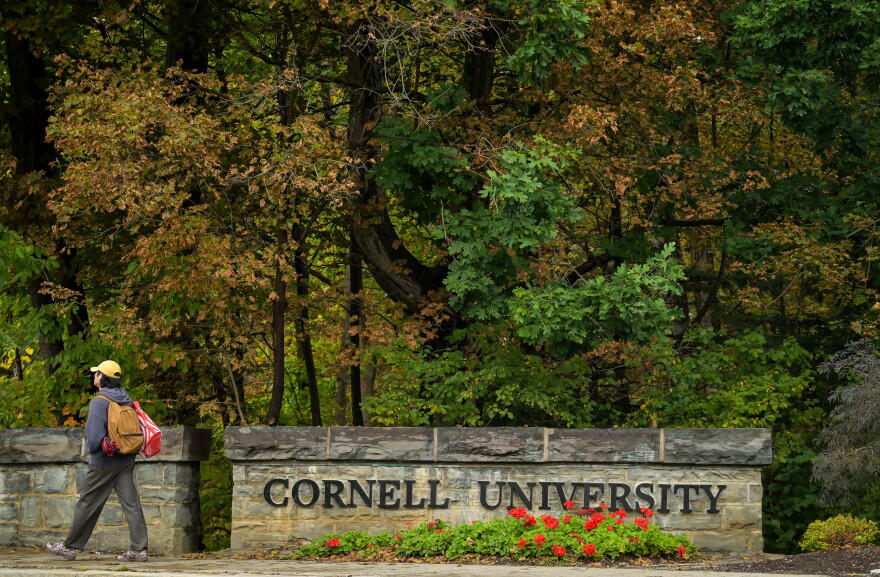 A student walks past a Cornell University sign in Ithaca, N.Y., Monday, Sept. 28, 2026.