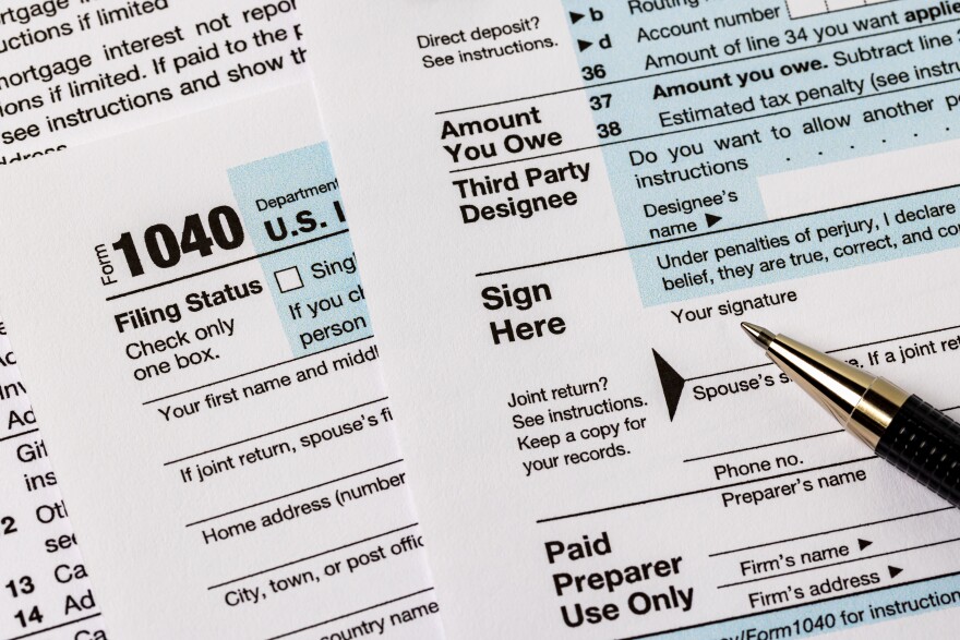 Tax preparation, fraud, and filing taxes concept.