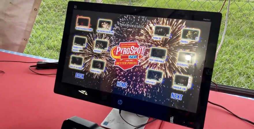 At Pyrospot, a touchscreen allows customers to select the name of the firework package they're interested in, and see a preview of how the fireworks will look in the sky.