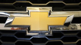 FILE - The Chevrolet logo is displayed at the 2020 Pittsburgh International Auto Show Thursday, Feb.13, 2020 in Pittsburgh. General Motors is recalling more than 484,000 large SUVs in the U.S., Tuesday, Aug. 16, 2022, to fix a problem that can cause the third-row seat belts to malfunction. The recall covers Chevrolet Suburbans and Tahoes, Cadillac Escalades and GMC Yukons from 2021 and 2022.