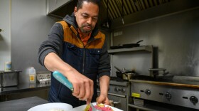 Victorino Antonio Rodriguez works in the kitchen of his Mi Sabor restaurant on Park Street in Hartford preparing Mangu, an iconic Dominican dish, featuring plantain mash with purple onions, fried cheese, fried salami and fried eggs on February 26, 2024. February 27 is Dominican Republic Independence Day and Afro-Dominican flavors are part of the tradition of its celebration.