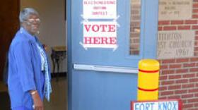 Eleanor Guerrero prepares to enter the Fort Knox precinct at Stithton Baptist Church to cast her first vote as a U.S. citizen. The 72-year-old native of Belize became an American this summer after living 43 years in the country.