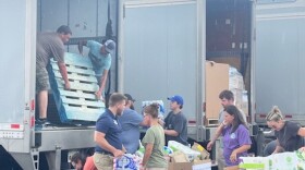 Volunteers unload food and other supplies in Eastern Kentucky this week.