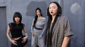 Artists Rei Ami (left), EJAE and Audrey Nuna are behind the singing voices of the fictional girl group HUNTR/X in KPop Demon Hunters.