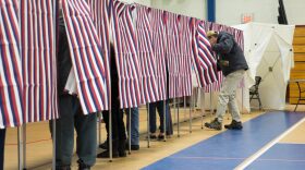 Voters fill out their ballots at the Broken Ground School during the presidential primary in Concord, New Hampshire. 