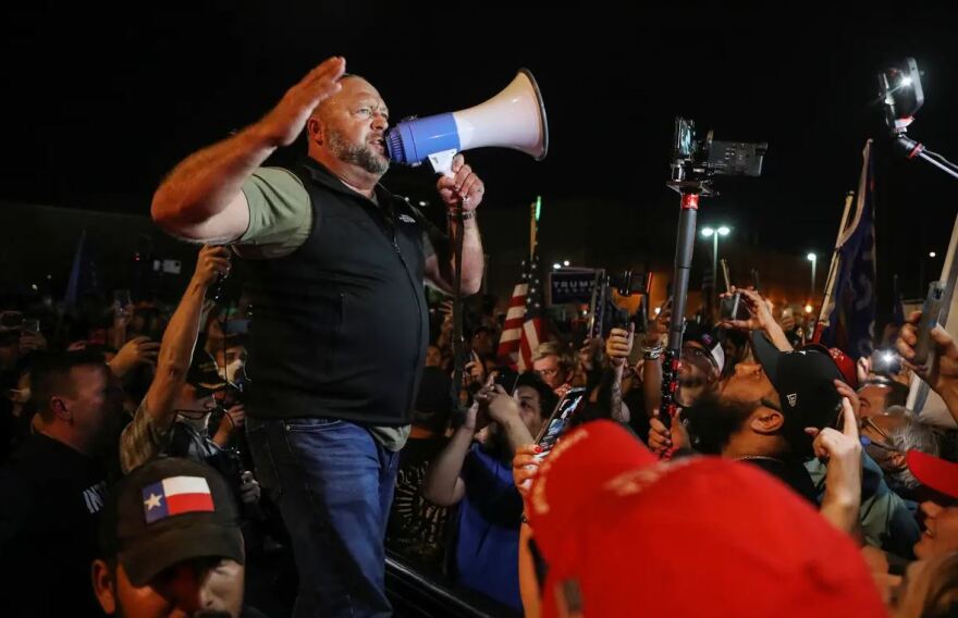 Jones speaks to supporters of former President Donald Trump who gathered in Phoenix on Nov. 5, 2020, to protest the early results of that year’s presidential election.